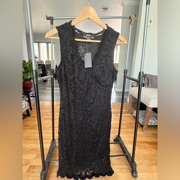 Dresses, tops, shorts, skirt with tags - Picture 3 of 16